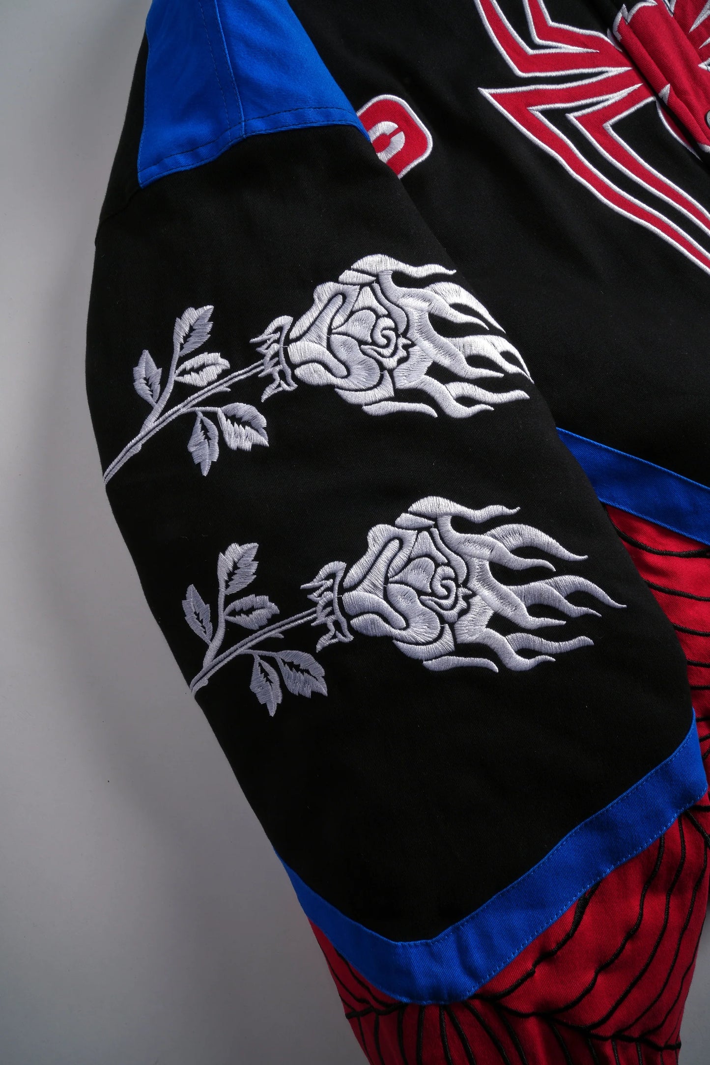 City Swinging Racing Jacket in Black/Blue/Red